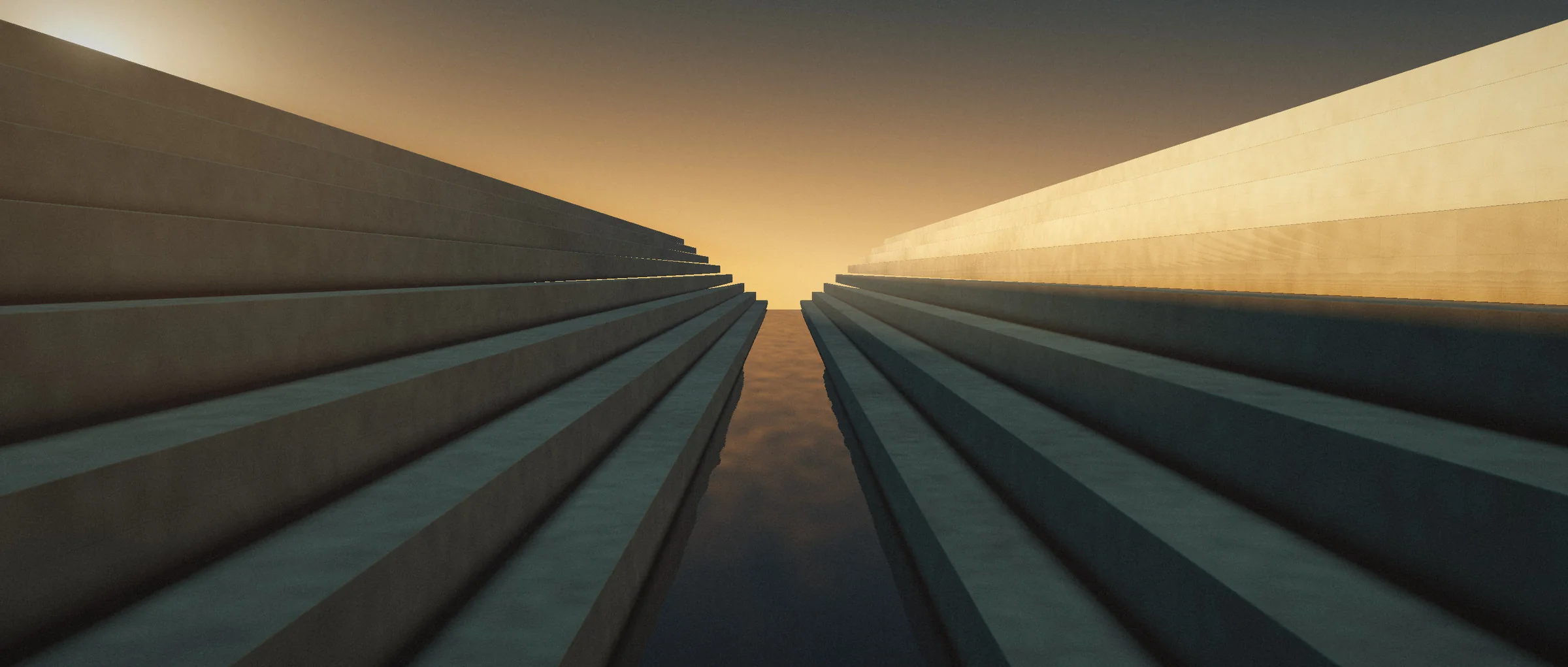 Terraces of stone stepping down on either side to a channel of water at dusk